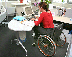 woman_in_wheelchair_working_in_a_office